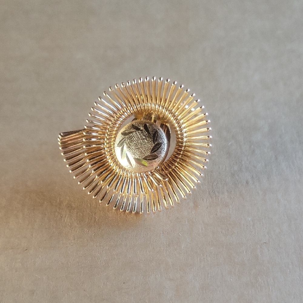 Elegant Gold Tone Spiral Brooch